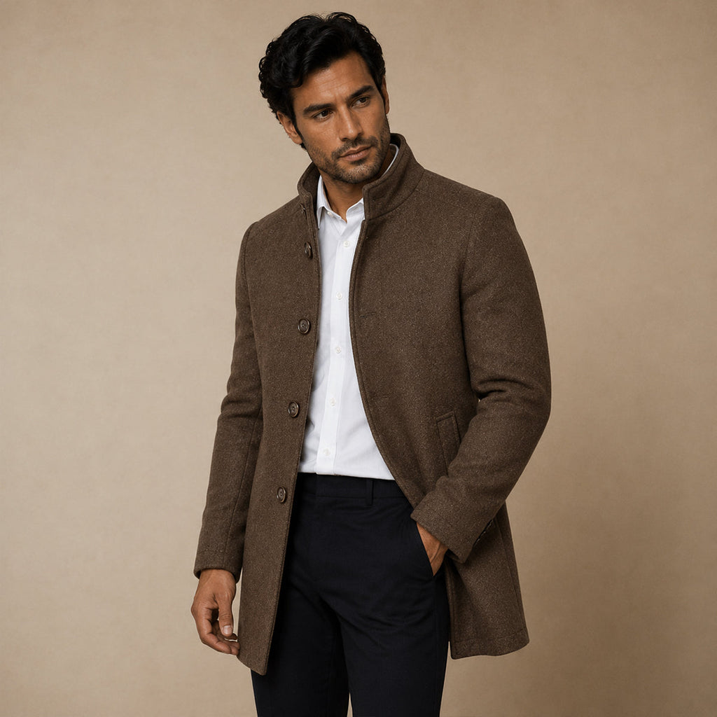 Men's brown wool coat worn open over a shirt, showing button placket and side pockets.