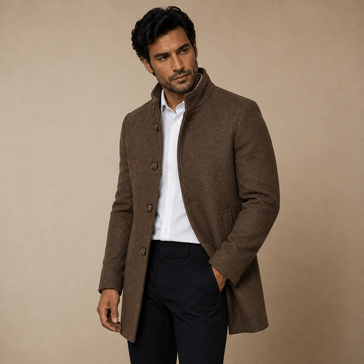 Men's brown wool coat worn open over a shirt, showing button placket and side pockets.