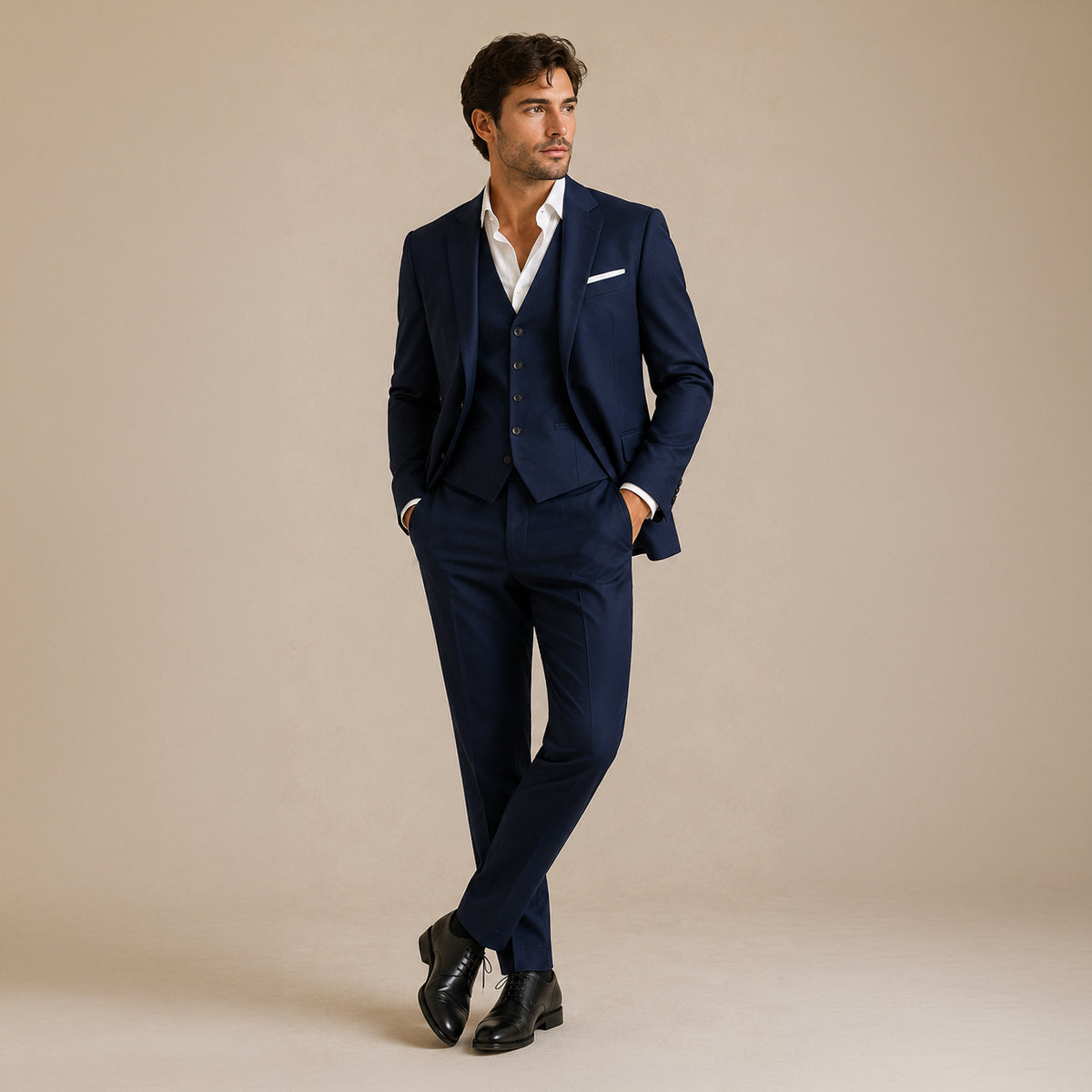 Men's navy 3-piece suit set on model with blazer, vest, and matching trousers