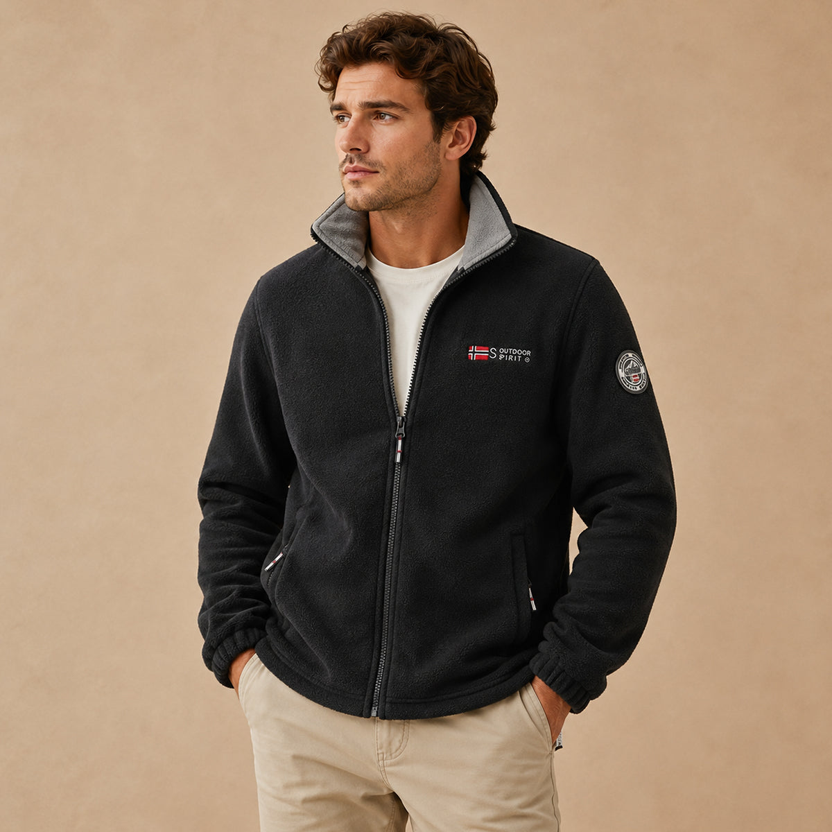 Men's black fleece-lined outdoor jacket, full-zip front and chest logo patch