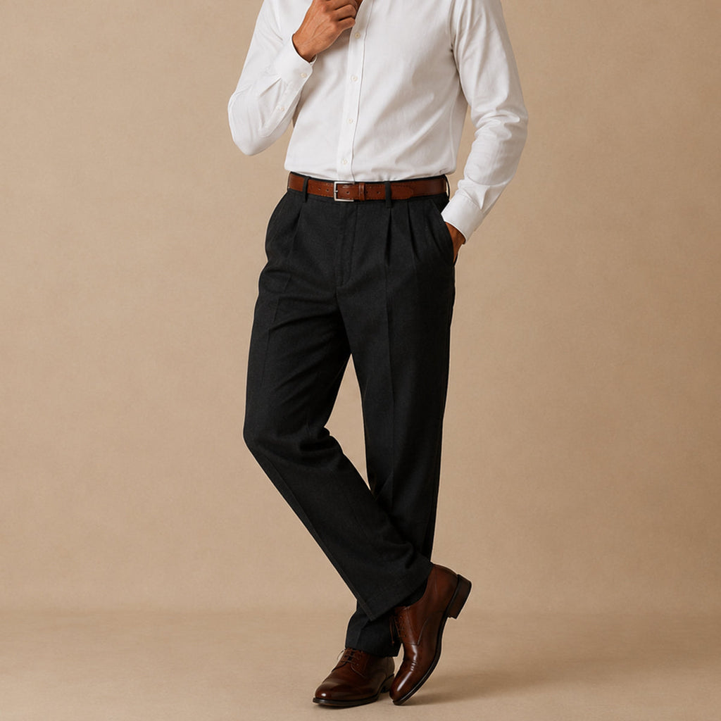 Men's black pleated straight pants worn with a brown belt and leather shoes