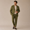 Olive green slim fit business suit set on model, blazer and tapered trousers