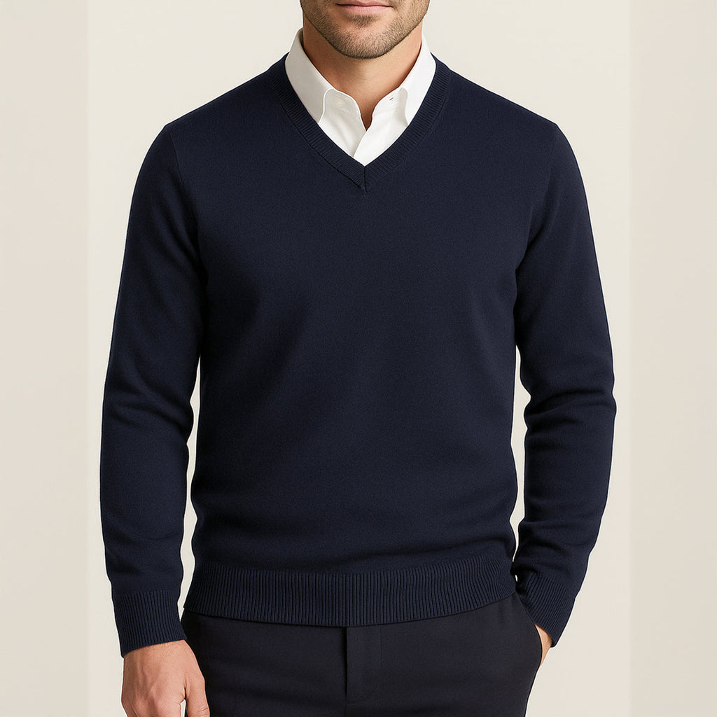 Men's navy cashmere V-neck sweater with ribbed cuffs and hem.