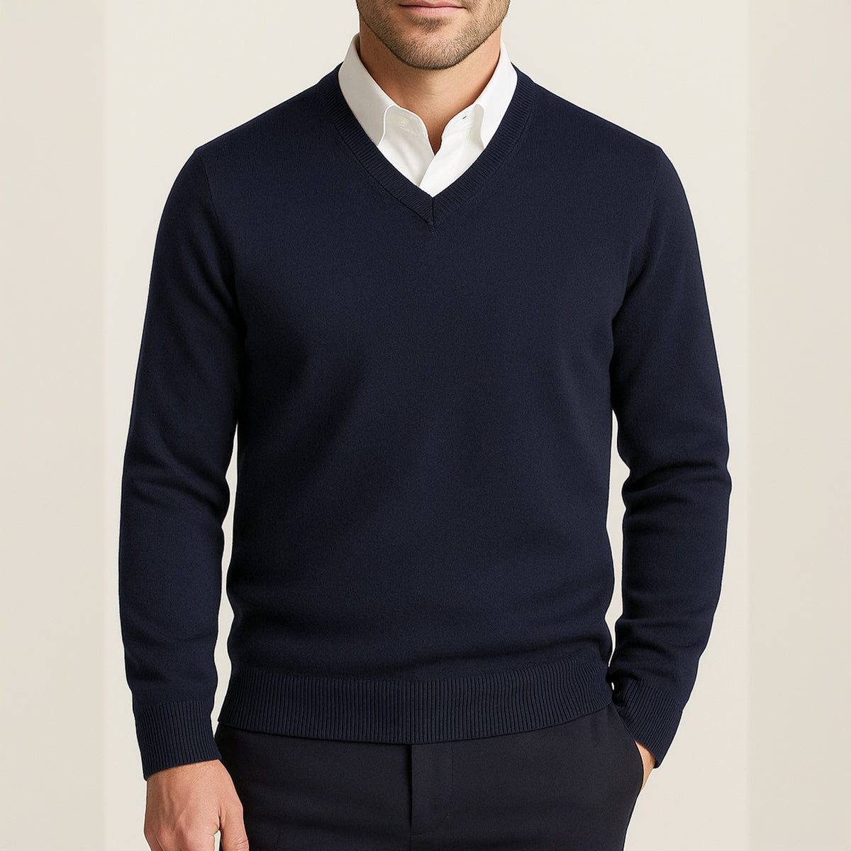 Men's navy cashmere V-neck sweater with ribbed cuffs and hem.