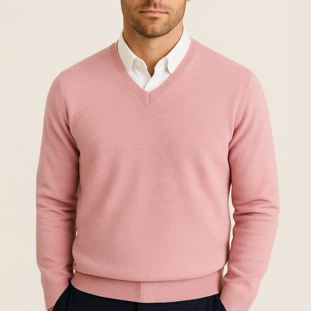 Men's pink cashmere V-neck sweater with ribbed cuffs and hem.