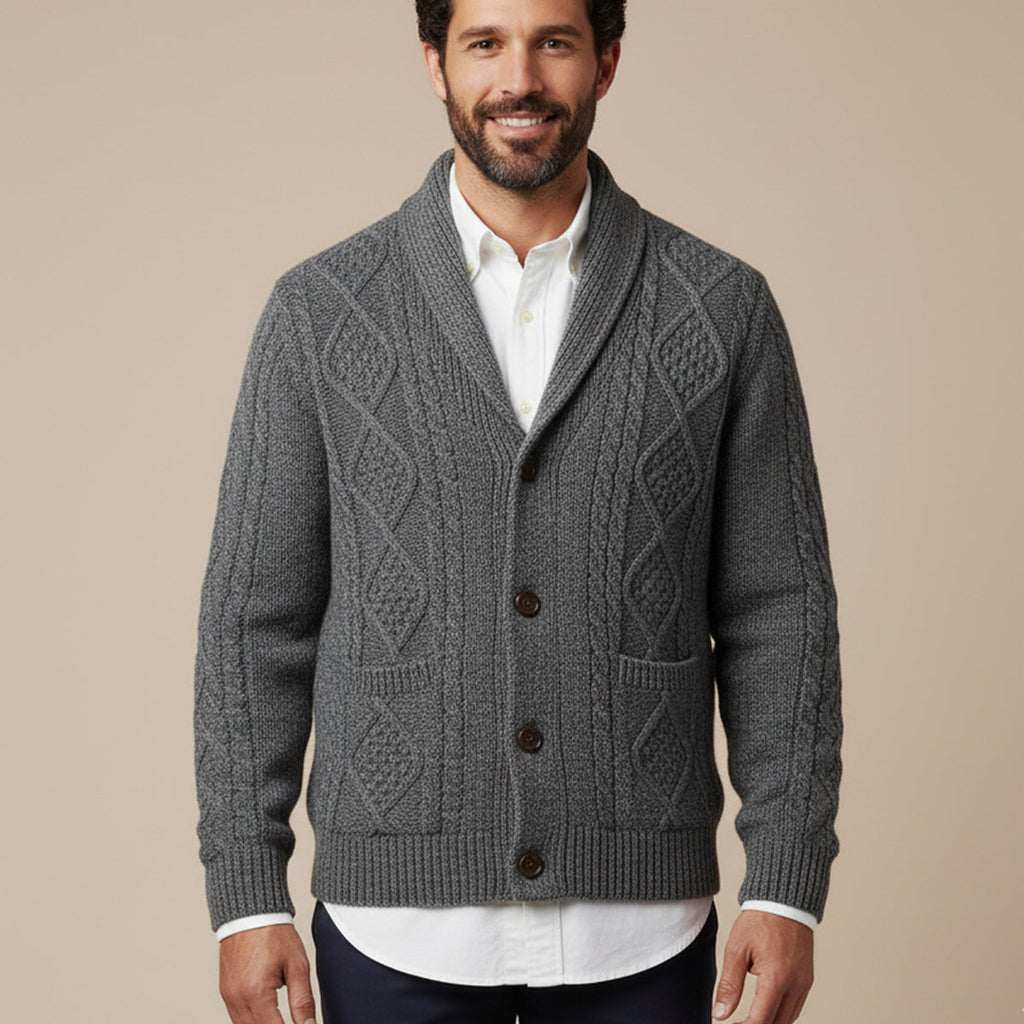 Men's gray cashmere cardigan with shawl collar, cable knit pattern, and button front.