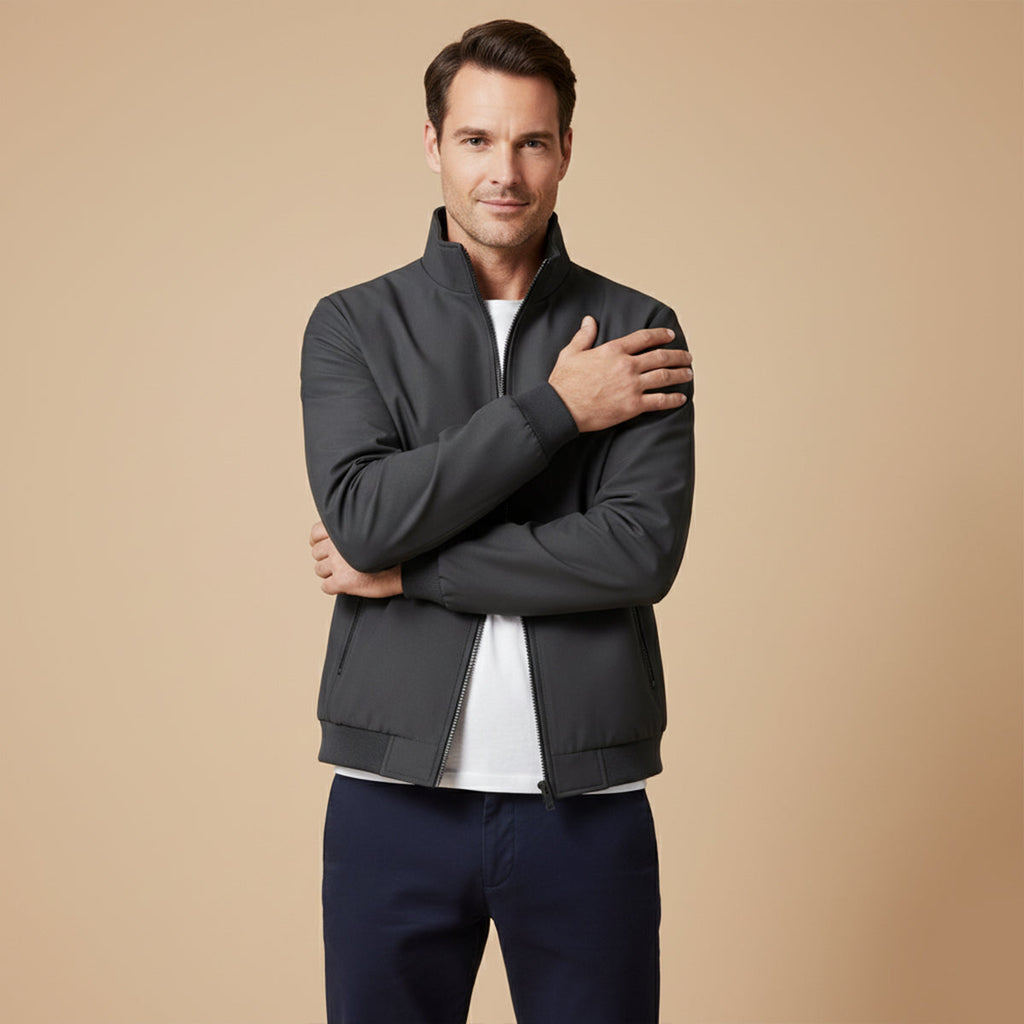 Men’s gray fleece-lined jacket with zipper front and stand collar, worn over a shirt.