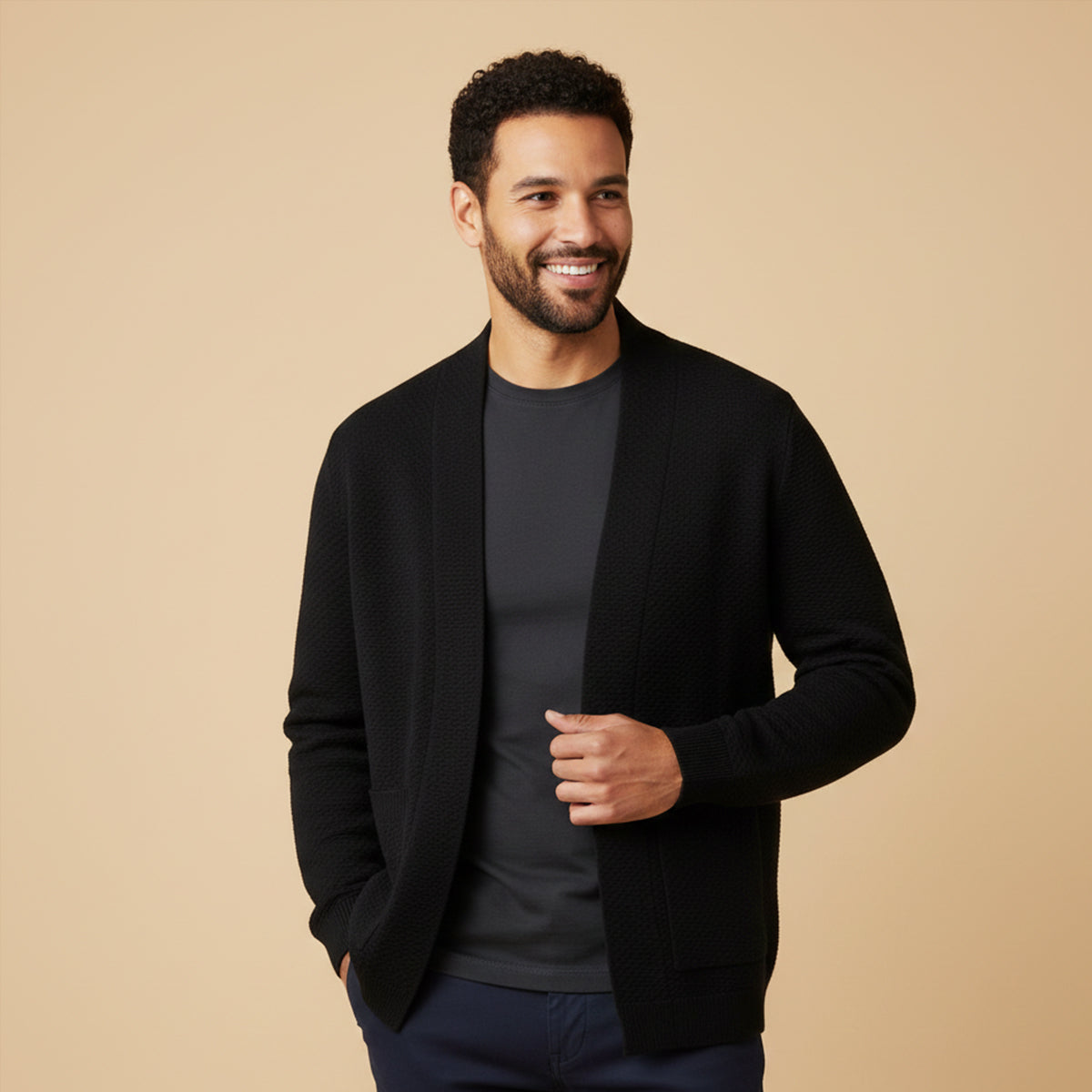 Men's black open-front knit cardigan with patch pockets, ribbed cuffs